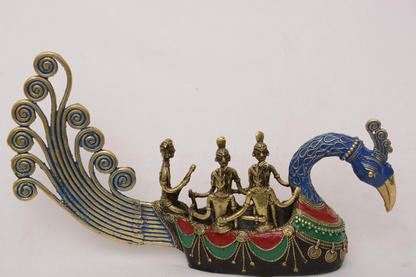 Tribal brass peacock boat - Riding on a peacock